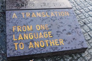 A translation from one language into another (carved in stone)