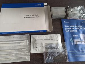 NHS Covid-19 laminar flow test kit, opened to show its contents